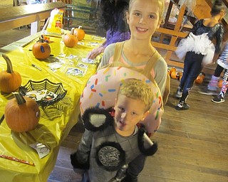 Neighbors | Zack Shively.Mill Creek Metroparks held a Halloween party at Lanterman's Mill on Oct. 21. The park provided a number of fun and games on the bottom floor of the mill. They had a table for pumpkins, which the families decorated and took home with them.
