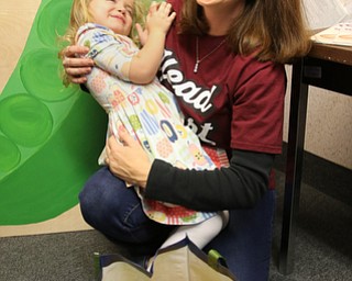   ROBERT K YOSAY  | THE VINDICATOR..Having a fun moment after shopping is Missy and MacKenzie Christy (3)...A $35,000 grant from the Swanston Foundation helped Alta Head Start at families to get fresh produce from a semi-annual farmersÕ market...-30-