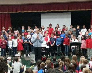 Neighbors | Zack Shively.The fourth-graders' music teacher, Robert Pavalko, taught the students the songs and movements. He spoke a couple times during the performance and had the students introduce songs and give Veterans Day history.