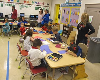 Neighbors | Zack Shively.Union Elementary students attached name tags on their Christmas bulbs. One side of the tag said "thank you" and the other side said either “hero,“ “brave“ or “strong,“ depending on the student's choice.