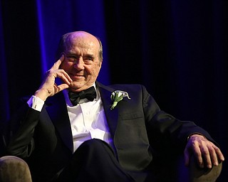 Tom Humphries laughs during a "roast and toasts" during a retirement dinner honoring Humphries, who has served as the president & CEO of the Youngstown/Warren Regional Chamber for the past 20 years, Saturday, Nov. 18, 2017, at Mr. Anthony's in Boardman...(Nikos Frazier | The Vindicator)