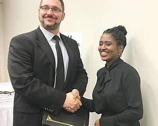 Campbell Memorial High School was the recipient of two Excellence in Education Awards at a luncheon that took place in October. The first award was for achievements in critical data-driven, nontesting areas of graduation rates and industry-recognized credentials. The graduation-rate award was given to schools with at least 5 percent year-over-year improvement in the number of students graduating on time. CMHS also was awarded for having at least 5 percent of 2016-17 graduating students earn at least 12 points through an industry-recognized credential in one of 13 high-demand career fields. The seventh annual Excellence in Education Awards luncheon was hosted by Eastern Ohio Education Partnership. Above, from left, are Brad Yeager, Campbell Memorial High School principal, and Stephanie Shaw, Eastern Ohio Education Partnership executive director.