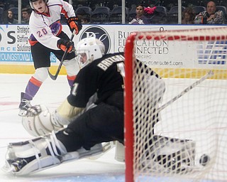 Youngstown Phantoms center Curtis Hall (20) scores a goal against Muskegon Lumberjacks goalie Adam Brizgala (1) during the second period of a USHL hockey game, Wednesday, Nov. 22, 2017, at the Covelli Centre in Youngstown. Phantoms won 7-3...(Nikos Frazier | The Vindicator)..