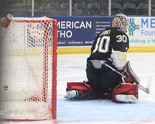 A puck flies past Muskegon Lumberjacks goalie Keegan Karki (30) for a goal during the third period of a USHL hockey game, Wednesday, Nov. 22, 2017, at the Covelli Centre in Youngstown. Phantoms won 7-3...(Nikos Frazier | The Vindicator)..