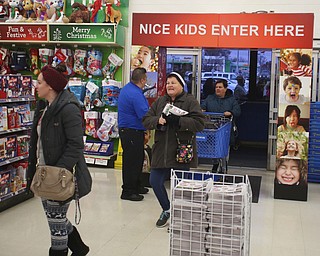 Customers rush into the store during Black Friday shopping, Thursday, Nov. 23, 2017, at the Toys R Us in Boardman...(Nikos Frazier | The Vindicator)