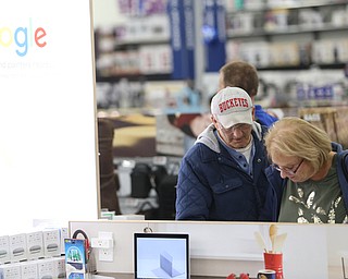 Diane and Joe Morris of Youngstown look at Google devices during Black Friday shopping, Thursday, Nov. 23, 2017, at the Best Buy in Boardman...(Nikos Frazier | The Vindicator)