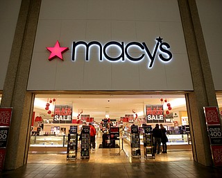 Customers walk in and out of the store during Black Friday shopping, Thursday, Nov. 23, 2017, at Macy's in Southern Park Mall in Boardman...(Nikos Frazier | The Vindicator)