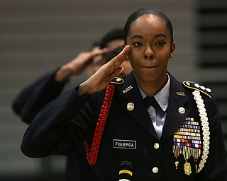 Cadet Cpt. Rosezena Figueroa salutes during a J.R.O.T.C drill practice, Thursday, Nov. 16, 2017, at East High School in Youngstown...(Nikos Frazier | The Vindicator)