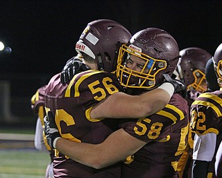 South Range linemen Matt Brooks (56) and Jordan Lowery (58) consol each other  after loosing Friday nights matchup against Eastwood at Strongsville High School.Dustin Livesay |  The Vindicator  11/24/17  Strongsville.