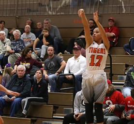 Howland's Ka'Rina Mallory (12) goes up for three during the second quarter of the Toni Ross Spirit Foundation basketball tournament, Saturday, Nov. 25, 2017, at Howland High School in Howland. South Range won 55-51...(Nikos Frazier | The Vindicator)..