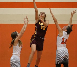 South Range's Maddi Durkin (13) hooks behind the basket for a layup during the fourth quarter of the Toni Ross Spirit Foundation basketball tournament, Saturday, Nov. 25, 2017, at Howland High School in Howland. South Range won 55-51...(Nikos Frazier | The Vindicator)..