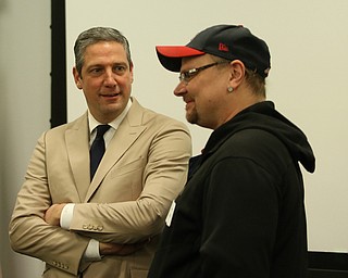 Rep. Tim Ryan(D-Ohio) talks with Todd Shay(right), a re-speak graduate, during AI-Media's launch, Monday, Nov. 20, 2017, at the Youngstown Business Incubator in Youngstown...(Nikos Frazier | The Vindicator)