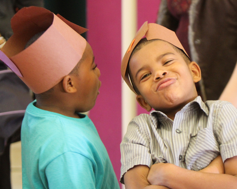 William D. Lewis The Vindicator Harding Elem School kindergarteners Ja'meere Clark, left, and Ja'Vonnie LaBooth donned speial hats for thanksgiving dinner at their school11-21-17
