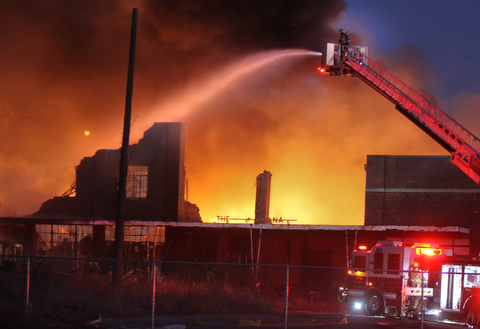 William D. Lewis The Vindicator  Firefighters from several Columbiana County departments respond to a fire at the former Salem China facilty on S. Broadway in Salem Tuesday Nov 28, 2017. Smoke from hte fire could be seen from Austintown.