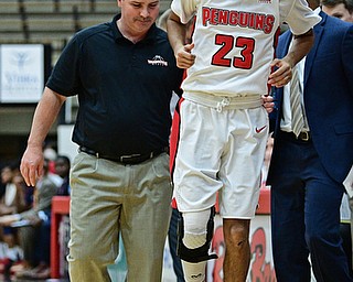 YOUNGSTOWN, OHIO - NOVEMBER 29, 2017: Youngstown State's Francisco Santiago hops off the floor after sustaining an injury during the second half of their game Wednesday night at Beeghley Center. Robert Morris won 81-74. DAVID DERMER | THE VINDICATOR
