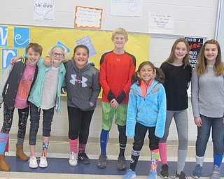 Neighbors | Zack Shively.Students at Poland Middle School wore mismatched socks to school on Oct. 31 to celebrate differences. The "Mix It Up Day" is a national program from No One Eats Alone.