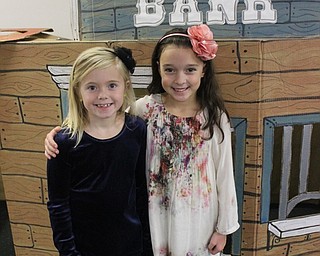 Neighbors | Abby Slanker.Two C.H. Campbell Elementary School students visited the town bank during the school’s annual book fair with the theme ‘Wild West - Saddle up and Read.'