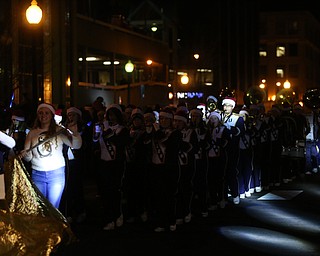 Members of the United Band perform during the annual Youngstown Christmas Parade and Tree lighting, Friday, Dec. 1, 2017, in downtown Youngstown...(Nikos Frazier | The Vindicator)