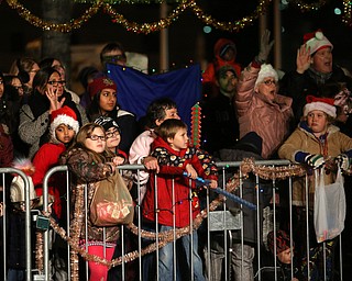 Onlookers during the annual Youngstown Christmas Parade and Tree lighting, Friday, Dec. 1, 2017, in downtown Youngstown...(Nikos Frazier | The Vindicator)