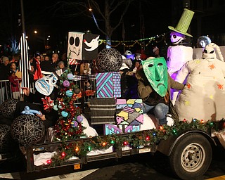 Members of the Purple Cat in a The Nightmare Before Christmas inspired float during the annual Youngstown Christmas Parade and Tree lighting, Friday, Dec. 1, 2017, in downtown Youngstown...(Nikos Frazier | The Vindicator)