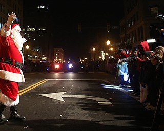 Santa arrives on Federal St. during the annual Youngstown Christmas Parade and Tree lighting, Friday, Dec. 1, 2017, in downtown Youngstown...(Nikos Frazier | The Vindicator)