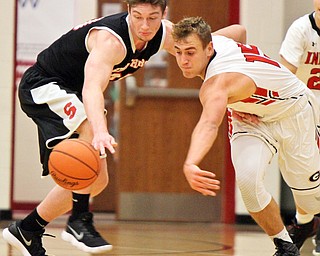 William D. Lewis Girard's Mark Waid(15) and Struther's Ryan Leonard(20)during 12012017 action at Girard.