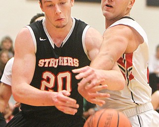 William D. Lewis Girard's Mark Waid(15) and Struther's Ryan Leonard(20)during 12012017 action at Girard.