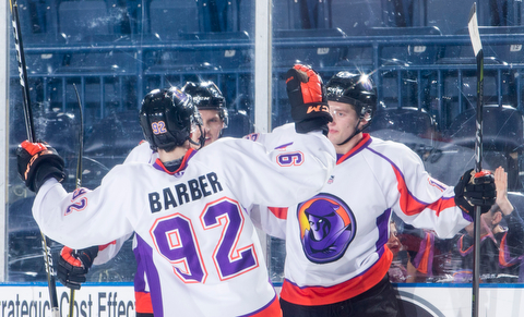 Scott R. Galvin | The Vindicator.Youngstown Phantoms center Alexander Barber (92) congratulates right winger Chase Gresock (19) on his goal during the second period against Team USA NTDP on Friday night at the Covelli Centre.