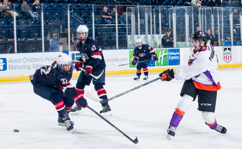 Scott R. Galvin | The Vindicator.Youngstown Phantoms left wing Tommy Parrottino (9) take a shot on goal during the third period against Team USA NTDP on Friday night at the Covelli Centre.