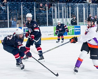 Scott R. Galvin | The Vindicator.Youngstown Phantoms left wing Tommy Parrottino (9) take a shot on goal during the third period against Team USA NTDP on Friday night at the Covelli Centre.