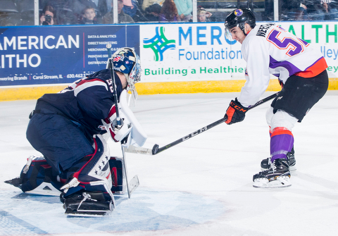 Scott R. Galvin | The Vindicator.Youngstown Phantoms left wing Craig Needham (52) takes a shot against Team USA goalie Spencer Knight during the third period on Friday at the Covelli Centre.