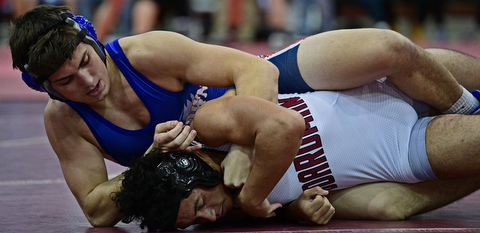 BOARDMAN, OHIO - DECEMBER 3, 2017: Fitch's AJ Stehura controls the arms of Boardman's Brandon Zigotti, during their 170lb bout, Saturday morning at Boardman High School. DAVID DERMER | THE VINDICATOR