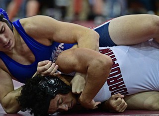 BOARDMAN, OHIO - DECEMBER 3, 2017: Fitch's AJ Stehura controls the arms of Boardman's Brandon Zigotti, during their 170lb bout, Saturday morning at Boardman High School. DAVID DERMER | THE VINDICATOR