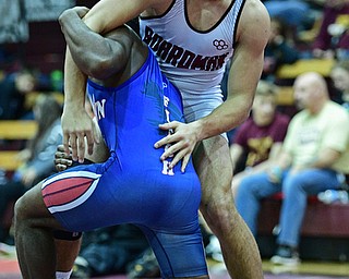 BOARDMAN, OHIO - DECEMBER 3, 2017: Boardman's Michael O'Horo works to prevent Fitch's Willie Beverly from getting back to his feet during their 182lb bout, Saturday morning at Boardman High School. DAVID DERMER | THE VINDICATOR