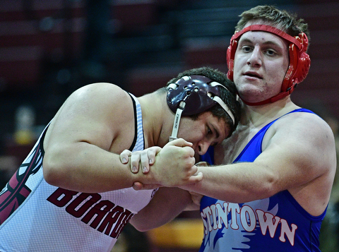 BOARDMAN, OHIO - DECEMBER 3, 2017: Fitch's Brock Kimble fights to keep control Boardman's Nick Caraballo during their 220lb bout, Saturday morning at Boardman High School. DAVID DERMER | THE VINDICATOR