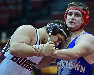 BOARDMAN, OHIO - DECEMBER 3, 2017: Fitch's Brock Kimble fights to keep control Boardman's Nick Caraballo during their 220lb bout, Saturday morning at Boardman High School. DAVID DERMER | THE VINDICATOR