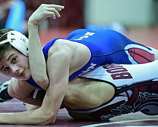 BOARDMAN, OHIO - DECEMBER 3, 2017: Fitch's Colin Roberts looks toward the clock while working to attempt to pin Boardman's Sam DeJoseph during their 106lb bout, Saturday morning at Boardman High School. DAVID DERMER | THE VINDICATOR