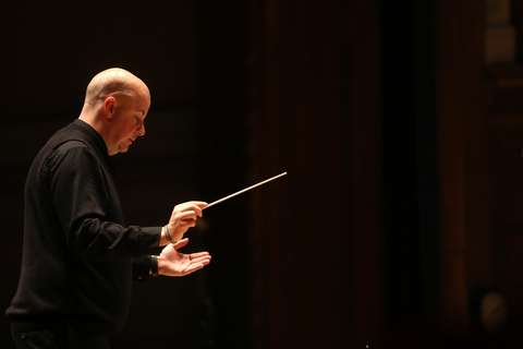 Wes O'Connor conducts the concert during a holiday craft show and third annual Tuba Christmas, Sunday, Dec. 3, 2017, at Stambaugh Auditorium in Youngstown...(Nikos Frazier | The Vindicator)