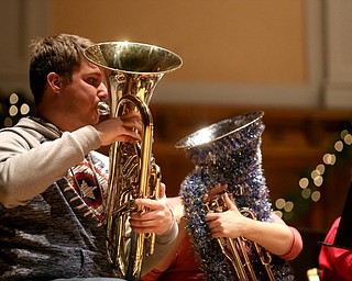 Brent Drysdale, a YSU Student, plays the euphonium during a holiday craft show and third annual Tuba Christmas, Sunday, Dec. 3, 2017, at Stambaugh Auditorium in Youngstown...(Nikos Frazier | The Vindicator)