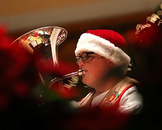 Cameron Thompson(16) of Niles plays the baritone during a holiday craft show and third annual Tuba Christmas, Sunday, Dec. 3, 2017, at Stambaugh Auditorium in Youngstown...(Nikos Frazier | The Vindicator)