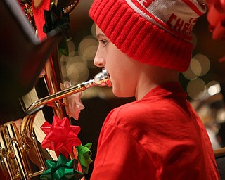 Thomas Russi(13) plays the baritone during a holiday craft show and third annual Tuba Christmas, Sunday, Dec. 3, 2017, at Stambaugh Auditorium in Youngstown...(Nikos Frazier | The Vindicator)