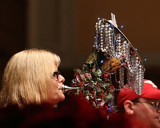 Tracy Lewis of Howland plays the baritone during a holiday craft show and third annual Tuba Christmas, Sunday, Dec. 3, 2017, at Stambaugh Auditorium in Youngstown...(Nikos Frazier | The Vindicator)