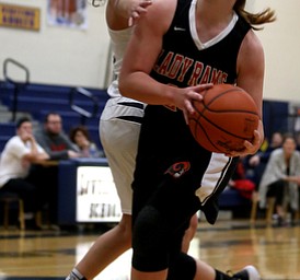 Mineral Ridge's Alexa Harkins (23) charges up for a layup during the fourth quarter as Mineral Ridge High School takes on Lowellville High School, Monday, Dec. 4, 2017, at Lowellville High School in Lowellville. Mineral Ridge won 45-33...(Nikos Frazier | The Vindicator)..