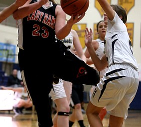 Mineral Ridge's Alexa Harkins (23) goes up for a layup during the fourth quarter as Mineral Ridge High School takes on Lowellville High School, Monday, Dec. 4, 2017, at Lowellville High School in Lowellville. Mineral Ridge won 45-33...(Nikos Frazier | The Vindicator)..
