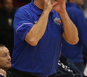 Poland's Ken Grisdale yells out a call in the third quarter of an AAC high school basketball game, Tuesday, Dec. 5, 2017, in Poland. Poland won 57-40...(Nikos Frazier | The Vindicator)..