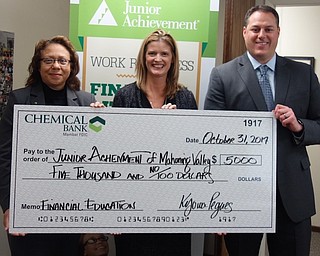 Junior Achievement of Mahoning Valley recently received a $5,000 grant from Chemical Bank to fund “Get Smart about Credit Day” financial education programming in Mahoning, Trumbull and Columbiana counties. The program helps students develop an understanding of credit and how to use it responsibly. Above from left, are Ky Pegues, CRA Market manager and bank officer, Chemical Bank Mahoning Valley; Michele Merkel, president, JAMV; and Michael Alexander, CTP, vice president and private banker, Chemical Bank Mahoning Valley. For information about JAMV, at www.warren-youngstown.ja.org. 