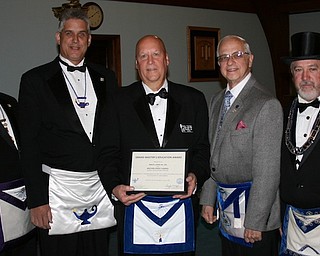 At a recent meeting, the Argus Lodge in Canfield honored Denny Furman with the Grand Master’s education award. This is the sixth-consecutive year he has received the award, which recognizes the programs and practices that encourage excellence in the education of lodge members. Furman lives in Berlin Center with his wife Mary Jo, where they own and operate Denny’s Auto Supply. Above, from left, are Mike Duhamel, district deputy; Terry Whitford, district education officer; Furman; James Streeky; and Chuck Prachick.