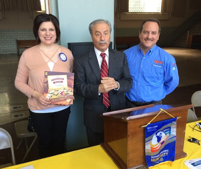 Bryan Higgins, Rotarian, introduced speaker Jim Ferraro, Western Reserve Transit Authority director, at the Struthers Rotary Club’s October meeting. The WRTA initially was funded by an assessment to property taxes in Youngstown, but with the devaluation of city properties over the years, the funding was modified to a sales-tax basis. The WRTA now serves all of Mahoning County, and its primary service is the movement of workers to and from jobs. At right, from left, are Jennifer Johnson, Rotary president; Ferraro; and Higgins. Johnson holds a book that will be donated to the Struthers Elementary School library in Ferraro’s name in appreciation for his presentation.
