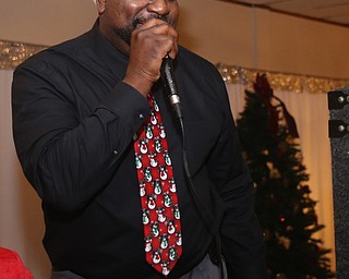 Youngstown Mayor-elect Jamael Tito Brown DJ's the 13th annual Winterfest special needs dance, Wednesday, Dec. 6, 2017, at the Mahoning Country Club in Girard...(Nikos Frazier | The Vindicator)