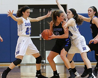 POLAND, OHIO - DECEMBER 6, 2017: Poland's Jackie Grisdale (21) and Poland's Marlie McConnell (20) defend against Lakeview's Lindsay Carnahan (2) during the 3rd qtr. at Poland High School. MICHAEL G. TAYLOR | THE VINDICATOR